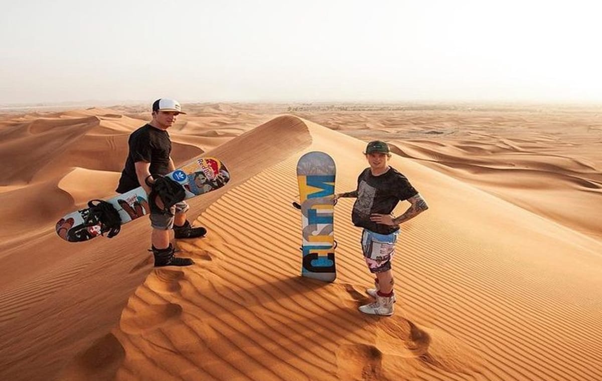 Dubai Desert Safari, Dune Bashing, Camel Ride, Sandboarding & BBQ