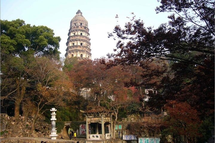 Shanghai to Suzhou by bullet train visit gardens and canal tour.