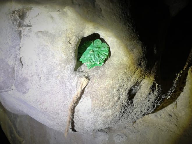 One of the offerings left among the stones