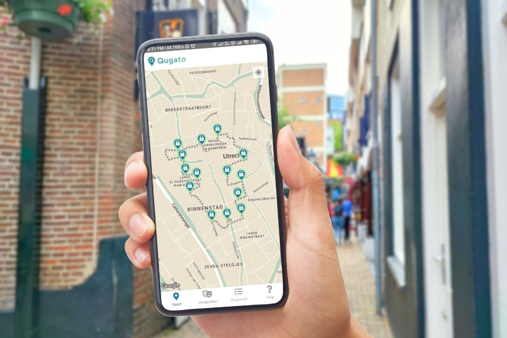 Photo of app interface screenshots during the City Detective Utrecht scavenger hunt. 
