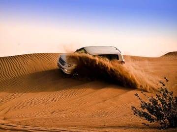 Dubai Evening Desert Safari with Dune Bashing & BBQ Dinner