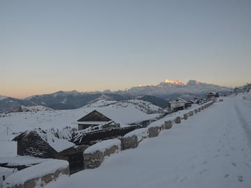 Early morning sunrays touch the Numbur mountain peak as seen from Jantardhap. Image Credit: The Kathmandu Post