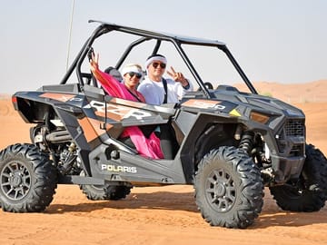 Short Desert Tour with Quad Bike Camel Ride Sandboard & Sunset