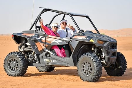 Luxury Desert Safari: Dune Buggy, Camel Ride, Sandboarding & BBQ Dinner