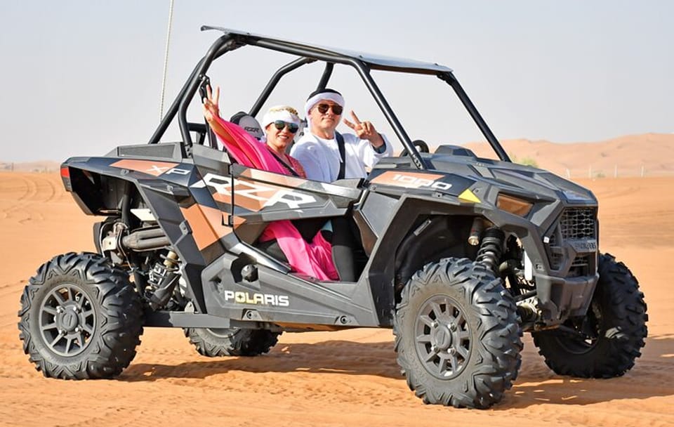 Premium Desert Safari with Dune Buggy, Camel Ride, and BBQ in Dubai