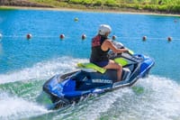Experience the thrill of jet skiing in the water park's designated area for an unforgettable Punta Cana adventure!