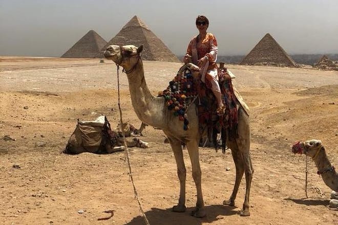 Giza Pyramids, camel ride at Giza Pyramids, Deluxe Travel Egypt, Deluxe tours Egypt
