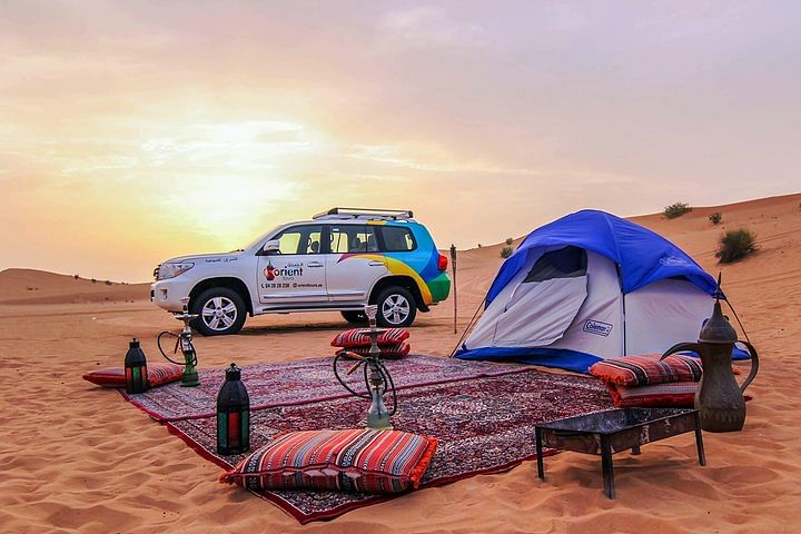 Desert Safari Adventure: BBQ Dinner, Dune Bashing & Camel Riding in Dubai