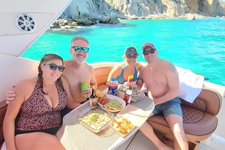 Savor delicious snacks and drinks on your private yacht while surrounded by Cabo's beauty.