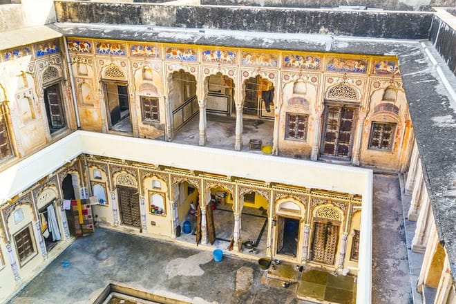 People in beautiful old haveli in Mandawa