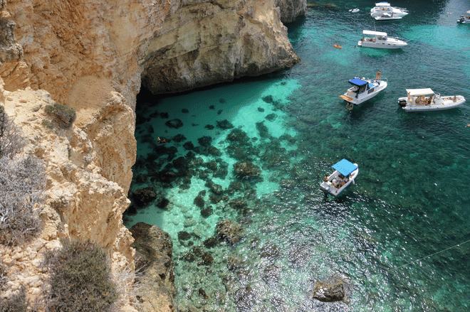 Boat Cruise to Halfa Rock, Blue Lagoon, Crystal Lagoon and Caves photo 3