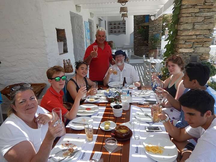 Eating a delicious meal with fresh ingredients in a local tavern in Paros