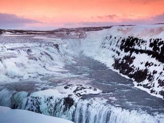 the milky water of the river cascading down into the gorge of Gullfoss waterfall