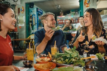 Ho Chi Minh City street food and city tour by motorbike