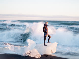 Icebergs on attacked by the ocean at Diamond Beach, Glacier Lagoon Iceland