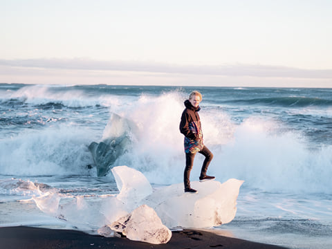Icebergs on attacked by the ocean at Diamond Beach, Glacier Lagoon Iceland