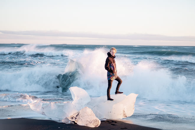 Icebergs on attacked by the ocean at Diamond Beach, Glacier Lagoon Iceland