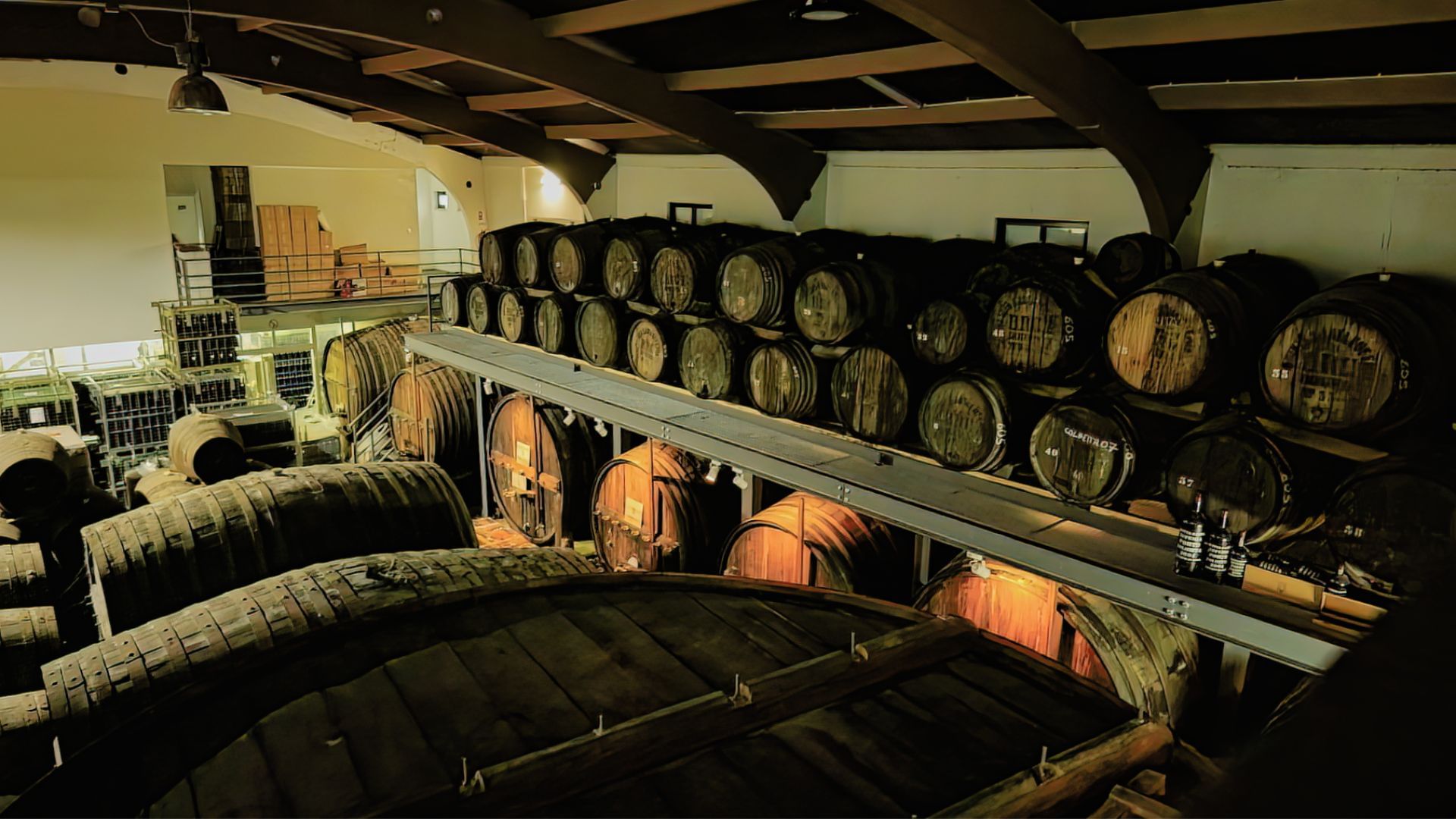 Image of a typical family-owned wine cellar in the Douro Valley with Port barrels on Cooltour Oporto's Douro Valley Wine Tour from Porto