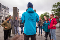 Our guide introducing themselves to a group of travellers