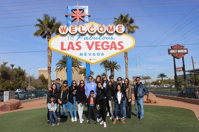 Stopping at the Las Vegas Sign to strike a pose