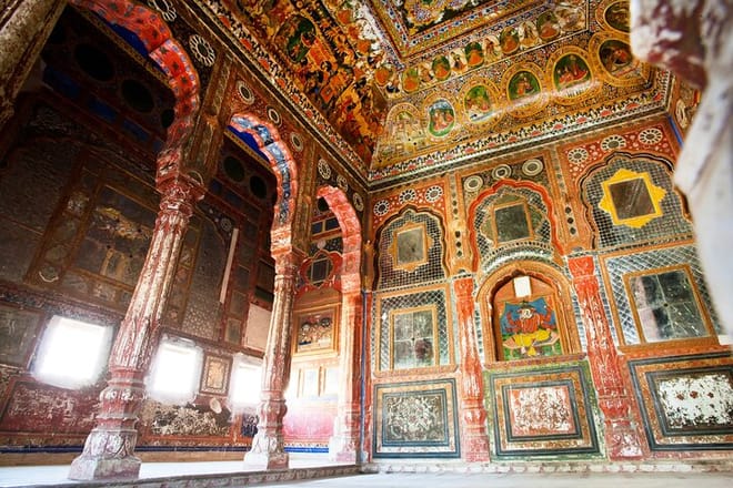 MANDAWA Interior of decorated room with old frescoes, 18th century Haveli house on February 7, 2019. With population of 21000, Mandawa is popular site with naive art Havelis homes