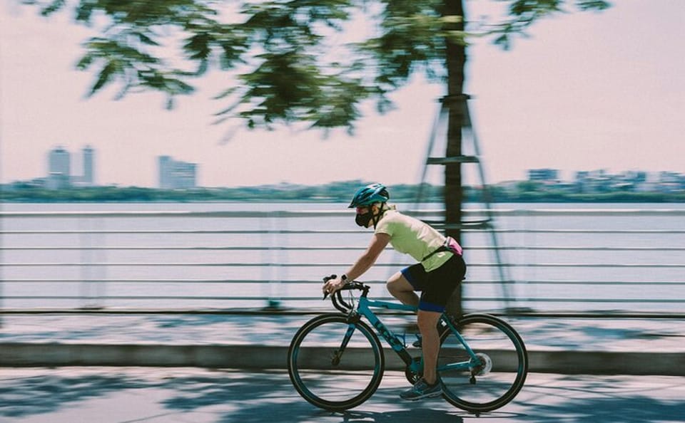 Cycling Tour of West Lake: Pagodas and Sunset Views in Hanoi
