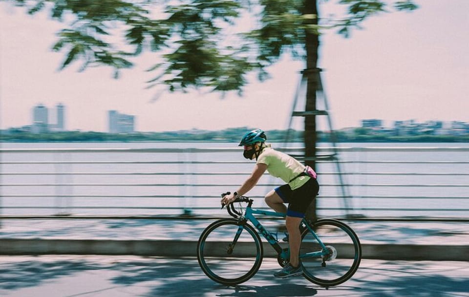 Cycling Tour of West Lake: Pagodas and Sunset Views in Hanoi