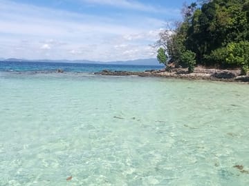 Puerto princesa pick up to portbarton island hopping