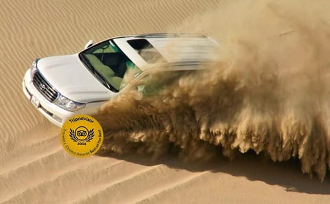 Desert Safari Adventure with Dune Bashing and Camel Ride in Doha