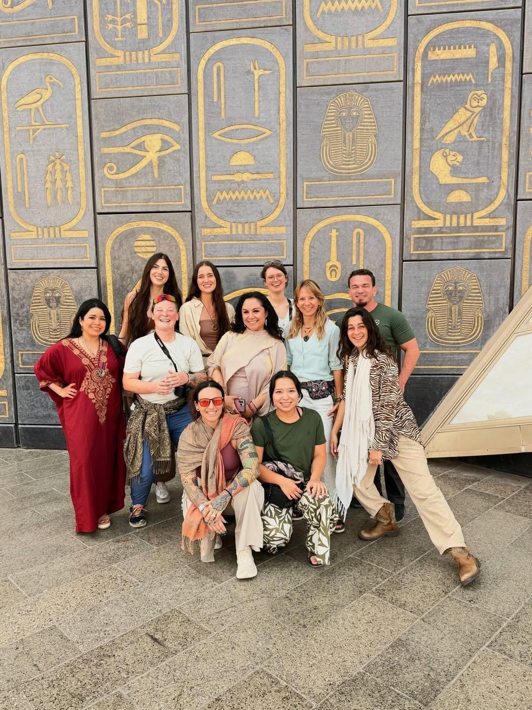 Family photo at the GEM on a Cairo cultural heritage excursion.