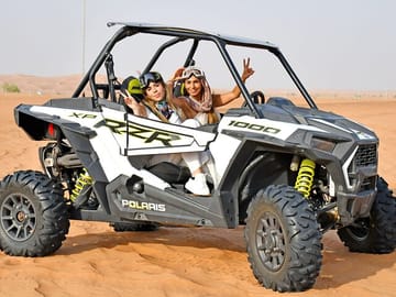Short Desert Tour with Quad Bike Camel Ride Sandboard & Sunset